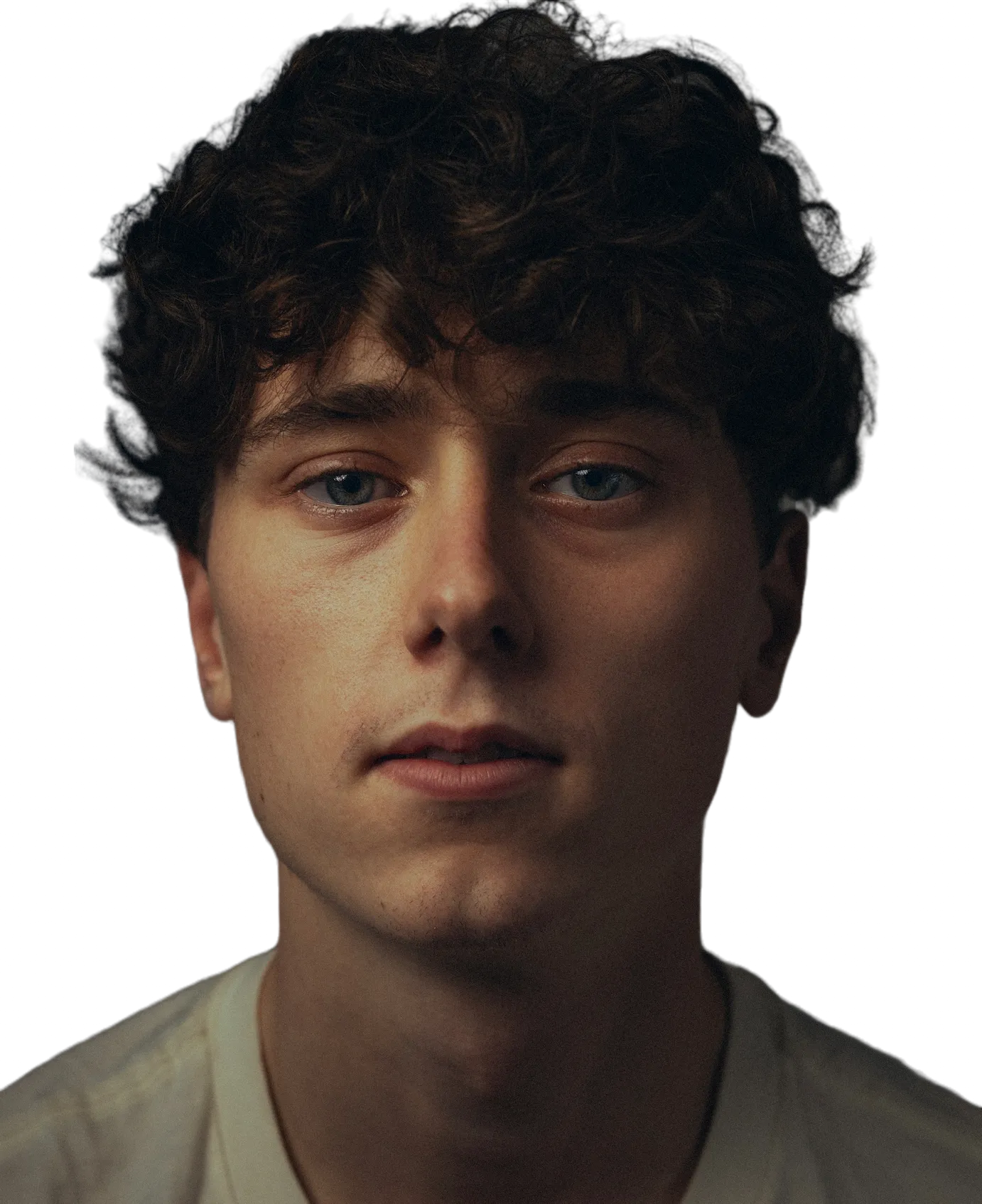 portrait of man with neutral expression.